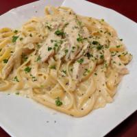 Fettuccine Alfredo · Pasta with rich butter and Parmesan sauce. Add Chicken for an additional charge.

