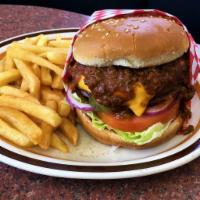 Chili Burger · Served with onions, lettuce, tomato, pickle and 1000 Island dressing.