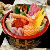 Chirashi · Assorted 4 kind of sashimi over bed of rice. Served with miso soup.