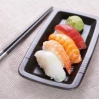 Nigiri Appetizer · 4​ pieces of assorted filets of raw fish on rice.