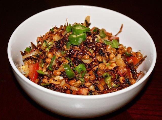 Bhatmas · Roasted soybeans mixed with spices, onions, green chilies, chopped ginger, garlic and a dash of lemon juice.