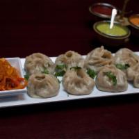Veg-Momo · 8 pieces steamed or fried vegetable dumpling filled with mixed vegetables, mashed potatoes a...