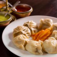 Sha-Momo · 8 pieces steamed or fried dumpling filled with ground meat, cabbage, onion, scallion, cilant...