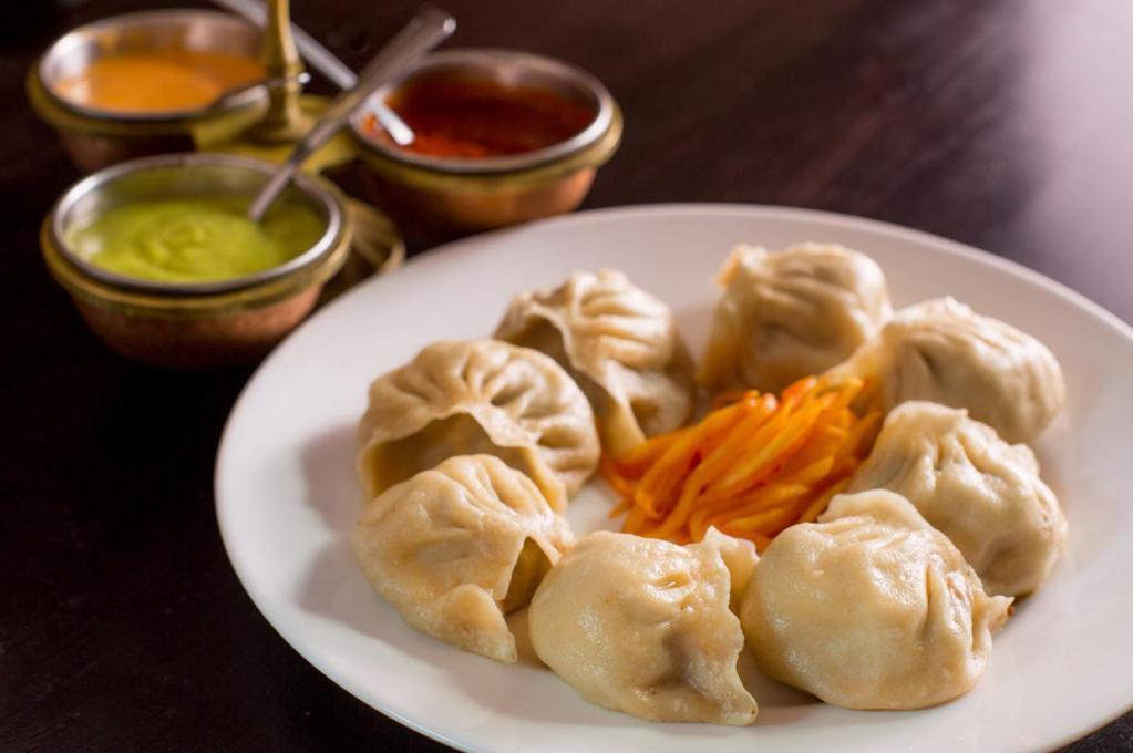 Sha-Momo · 8 pieces steamed or fried dumpling filled with ground meat, cabbage, onion, scallion, cilantro, garlic and ginger. Served with dangstel.