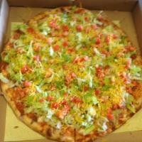 Omaha Taco Pizza · Mozzarella and cheddar cheese, slow cooked pork, red onion topped after bake with layers of ...