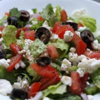 Greek Salad · Lettuce, cucumber, feta cheese, black olives, tomatoes and pepperoncini, red onions and garl...