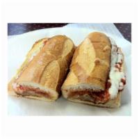 Veal Parmigiana Sandwich · Veal patty with marinara and mozzarella cheese.