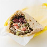 East Village Sandwich (vegetarian) · Falafel, Hummus, and Tabbouleh served: served in a pita pocket with lettuce, tomatoes, onion...