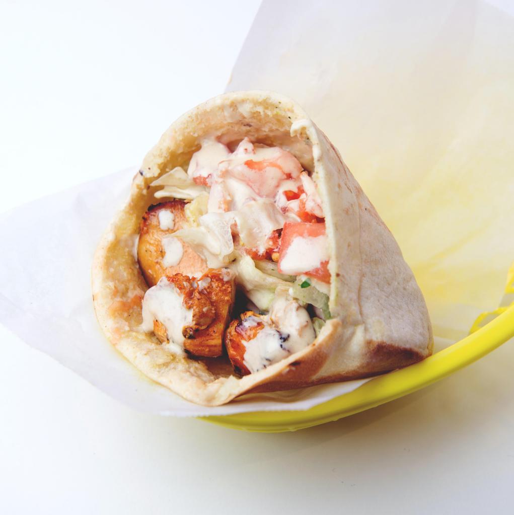 Chicken Kebab Sandwich · Marinated cubes of chicken breast, skewered and grilled; served in a pita pocket with lettuce, tomatoes, onions, and tahineh sauce