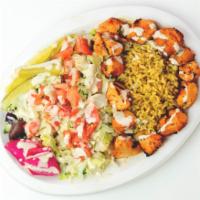 Chicken Kebab Plate · Marinated cubes of chicken breast, skewered and grilled; served over a choice of salad or se...