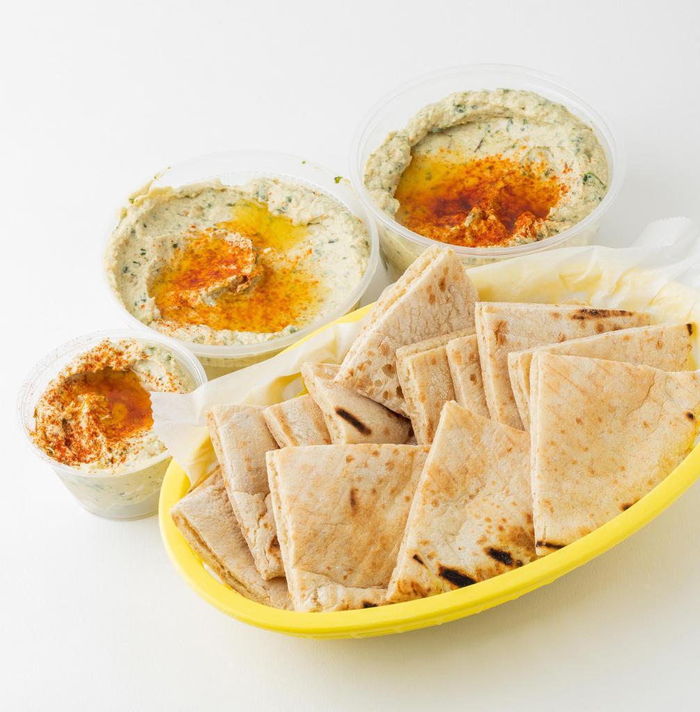 Baba Ganouj Side · Roasted eggplant spread made with parsley, garlic, and tahineh; served with pita bread