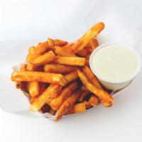 Seasoned Fries · Served with choice of garlic dipping sauce or ketchup