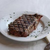 Rib Eye Steak · Charbroiled. With pasta and vegetable.