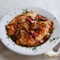Pollo di Scaparello · Chicken breast with red peppers, onions, sausage and pepperoni in a red wine demi-glaze.