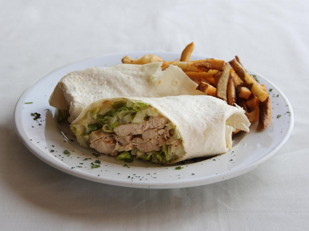 Chicken Caesar Wrap · Grilled chicken and romaine lettuce with homemade Caesar dressing and Parmesan cheese.