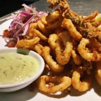 Chicharron de Calamares · Batter-coated and deep fried calamari squid. Served with salsa criolla.