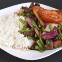 Vainita de Carne (Beef) · Lean tender beef sautéed , green beans, red onions and tomatoes, green onions, cilantro Serv...