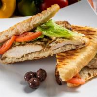 The Serres Panini · Grilled chicken breast with provolone cheese, romaine lettuce, tomatoes, cucumbers and garli...