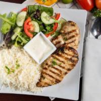 Grilled Chicken · Chicken breast marinated with garlic, lemon, salt and pepper. Served with rice, salad and pi...