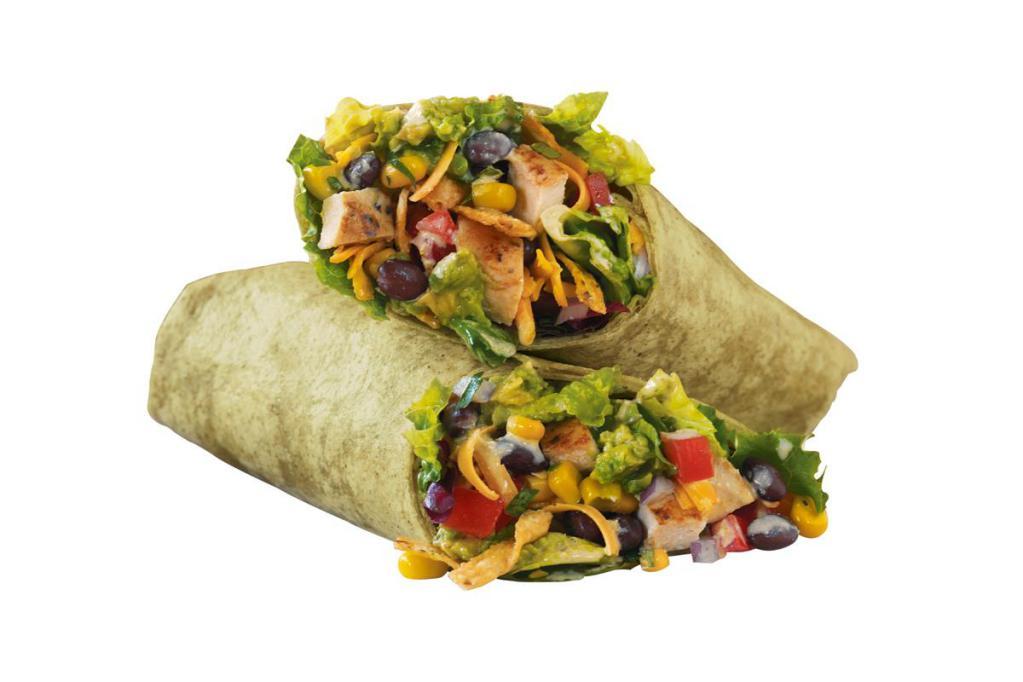 Santa Fe Chicken Wrap · Chicken, mixed greens with avocado, tomatoes, black bean & corn salsa, cheddar cheese, tortilla strips and Zesty Pepitas dressing, wrapped in a spinach tortilla
