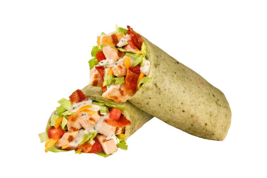 Bacon Ranch Chicken Wrap · Chicken, bacon, cheddar cheese, lettuce and tomatoes, with Ranch dressing, wrapped in a spinach tortilla