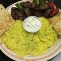 Beef Kabob Platter · ALL KABOB PLATTERS SERVED WITH GRILLED VEGGIES, A SIDE SALAD, PITA BREAD, TAZIKI SAUCE AND Y...