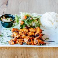 Chicken Shish Platter · Charbroiled all white meat chicken.  Served with rice, salad, hummus and pita bread. 