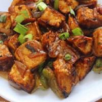 Chili Paneer · Cooked and sauteed with diced onions, bell peppers, and chilies.