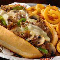 Philly Cheese Sandwich · Steak or chicken topped with sautéed onions, green peppers, mushrooms and provolone cheese a...
