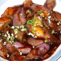 20. Szechuan Garlic Eggplant · Stir-fried eggplant and garlic in brown sauce. Hot and spicy.