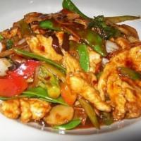 38. Szechuan Chicken · Chicken, bell peppers, carrots, bamboo shoots, mushrooms in spicy Szechuan sauce. Hot and sp...
