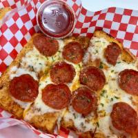 Garlic Bread · 4 pizza bread sticks served with homemade marinara sauce, melted mozzarella cheese or melted...
