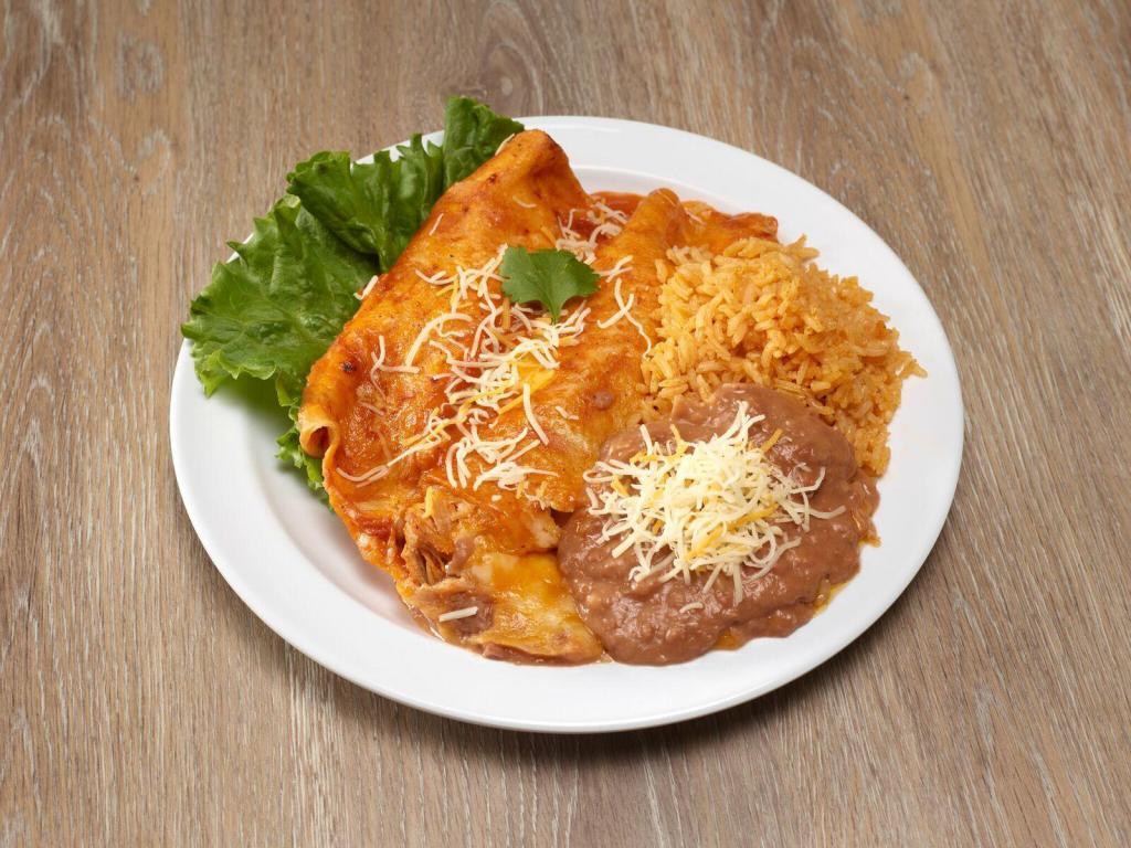 5. 2 Enchiladas de Arroz y Frijoles · 2 enchiladas serve with rice and beans.
