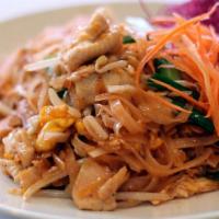 Pad Thai · Thin rice noodles stir-fried with egg, bean sprouts, green onion and crushed peanuts with ou...