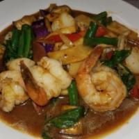 Spicy Combination Seafood · Dried pan fried combination of shrimp, squid and scallops with bell peppers and bamboo shoot...