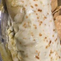 Wet Grilled Chicken Burrito green · Grilled chicken, onion, cilantro, rice and black beans, melted mozzarella cheese and salsa ....
