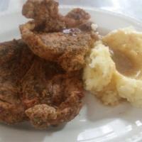 Pork Chops · Crispy fried, grilled or smothered in its own gravy 15 minutes.