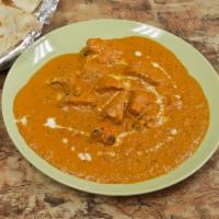 Butter Chicken · Tikka masala. Boneless chicken cooked in a rich creamy sauce. Served with choice of side.