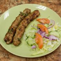 Kabab Roll · Seekh kababs wrapped in a tandoori naan with salad and special sauce.