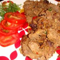 Bihari Kabab · Strips of beef or chicken grilled in tandoor. Served with salad and tandoori naan.