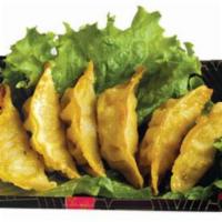 23. Gyoza · Steamed or fried pork dumplings.