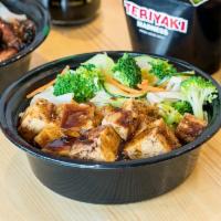 Spicy Tofu Teriyaki Bowl · Crisp tofu on the outside, soft on the inside. Our hand-cut tofu is fried then stir-fried in...