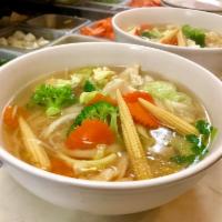 Vegetable Noodle Soup · Clear vegetable broth served with rice noodles and mixed vegetables.