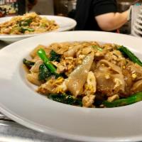 Pad See Iew · Flat rice noodles stir-fried with Chinese broccoli, egg and your choice of protein.