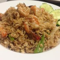Thai Fried Rice · Thai jasmine rice stir fried with onions, tomatoes, green onions and choice of protein.
