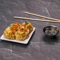 Tulip Dumplings · Shrimp, chicken and served with sesame soy sauce.