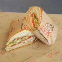 7. Pizzle Sandwich · Halal chicken, ranch, bacon and cheddar. Served with dirty sauce, lettuce and tomato.