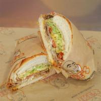 25. Barry B Sandwich · Turkey, bacon and Swiss. Served with dirty sauce, lettuce and tomato.