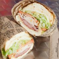 118. Tony Soprano Sandwich · Salami, ham, turkey, Italian dressing and provolone. Served with dirty sauce, lettuce and to...