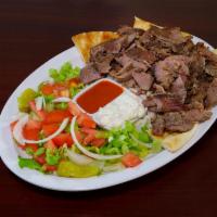 Doner Plate Beef and Lamb · Rice or Bulgur pilaf, salad and tzatziki sauce.